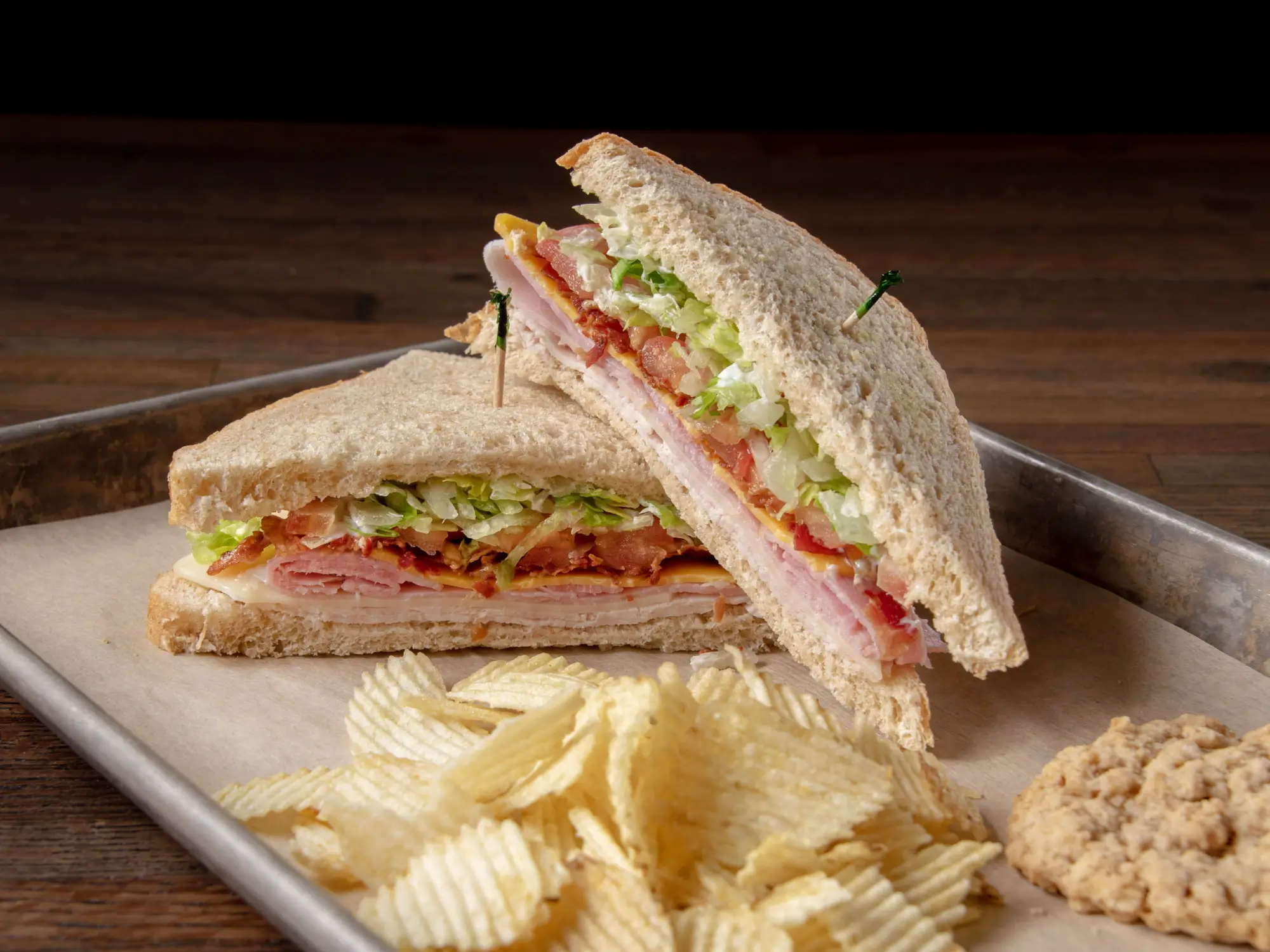Deli sandwich with chips and cookie from The Potter&rsquo;s Daughters Cafe in Bentonville